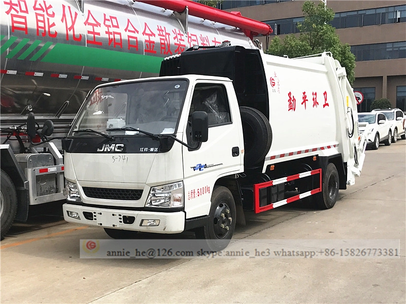Caminhão de lixo compactado JMC 6 CBM
