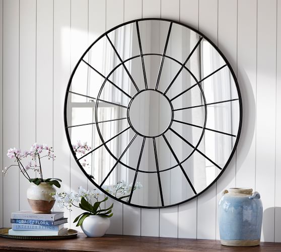 Black round metal wall mirror