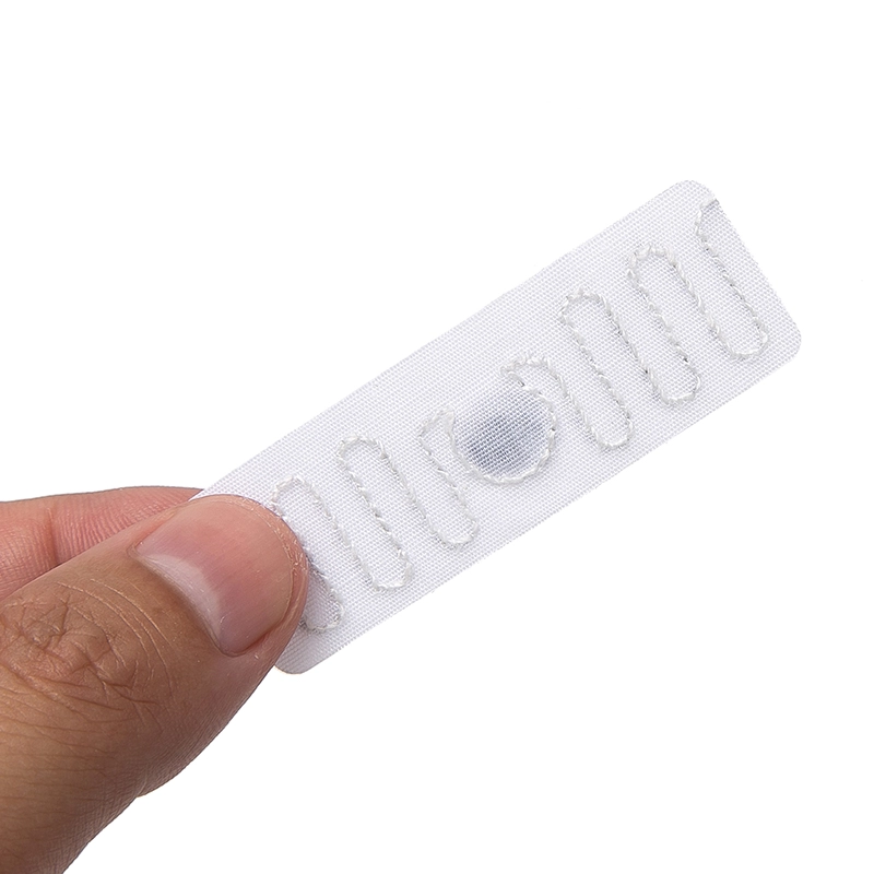 860-960MHz etiqueta branca tecida da roupa de linho de matéria têxtil da frequência ultraelevada RFID para o seguimento do vestuário do vestuário